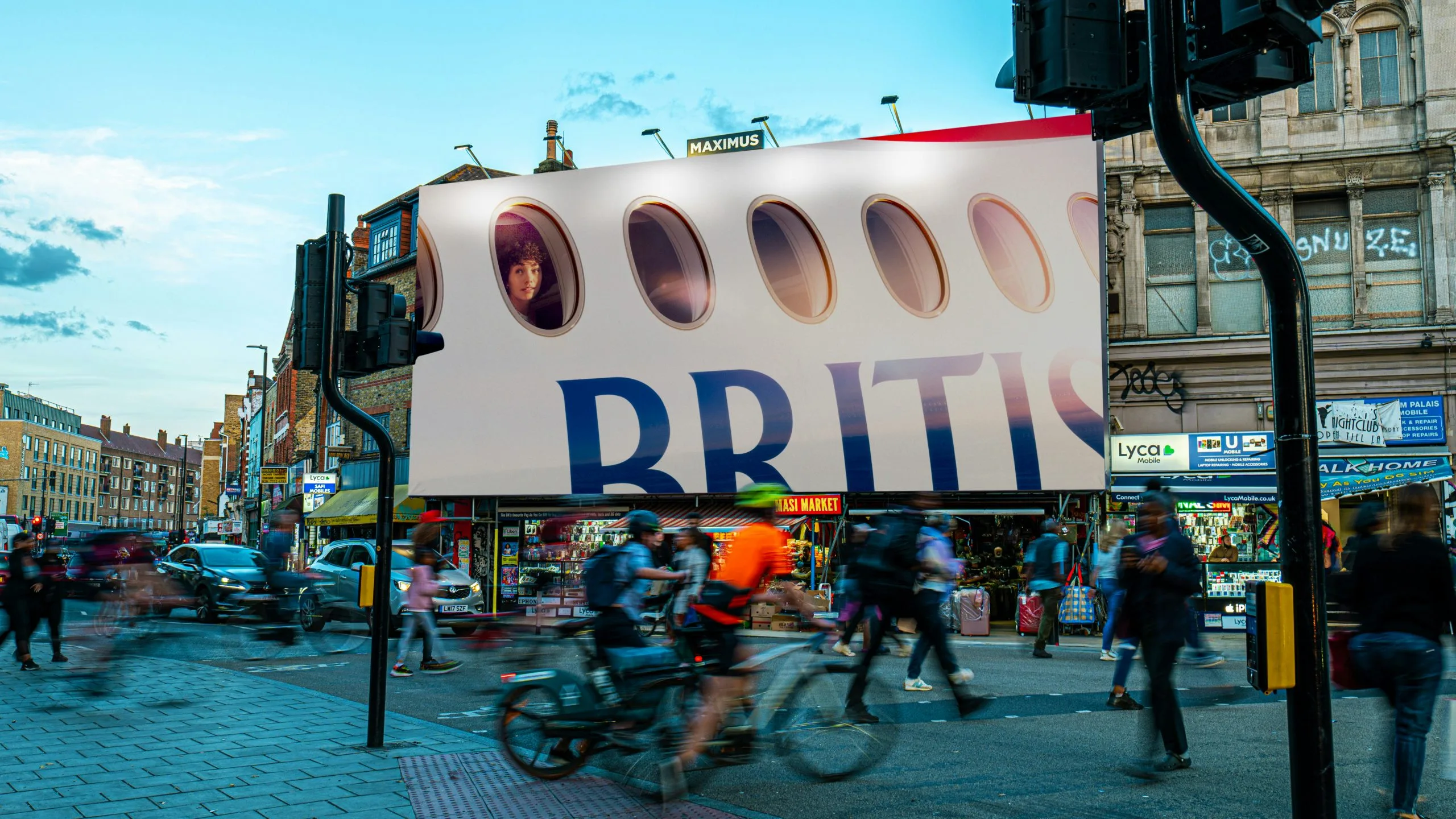 A large British Airways Windows billboard fills a busy London street corner while pedestrians, cyclists and traffic pass below.