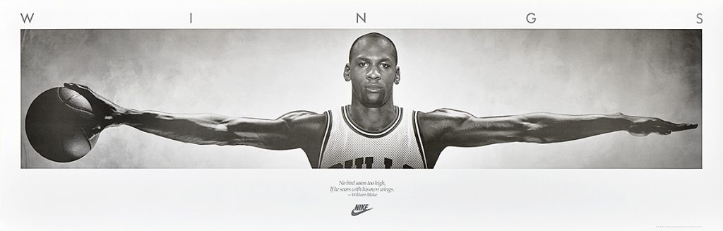 The complete Nike Wings poster: Michael Jordan with arms extended across a panoramic black-and-white photograph.