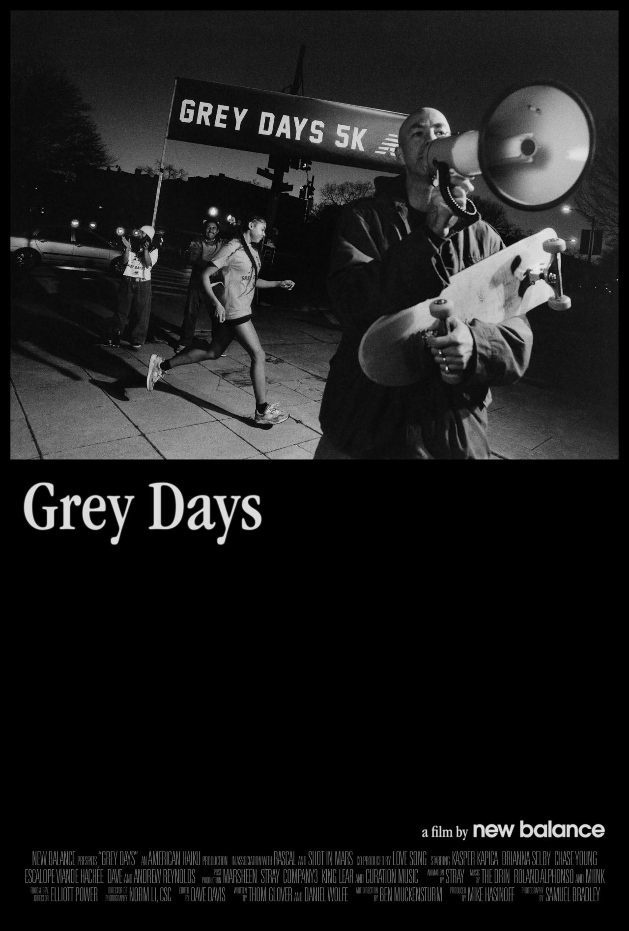 Black-and-white Grey Days poster showing runners passing a Grey Days 5K banner as a man holds a megaphone and skateboard; the campaign title and film credits sit below.