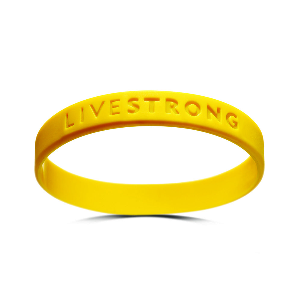 The original yellow silicone wristband embossed with the word LIVESTRONG