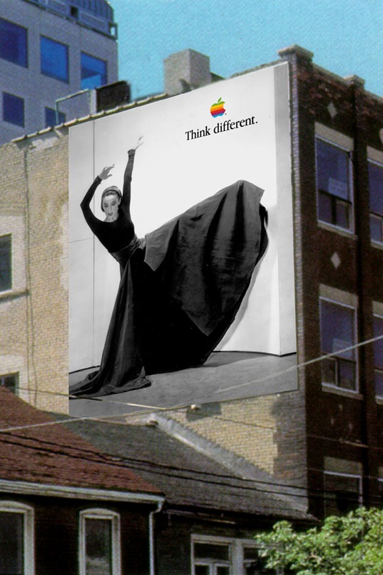 Martha Graham dances across a large Apple Think Different wall installation on a city building.